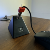 soporte para cable de mouse - mouse bungee versus